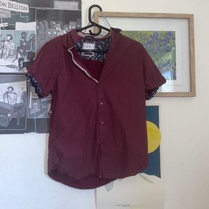 Size Medium Burgundy shorty sleeve button up with small white polka-dots.